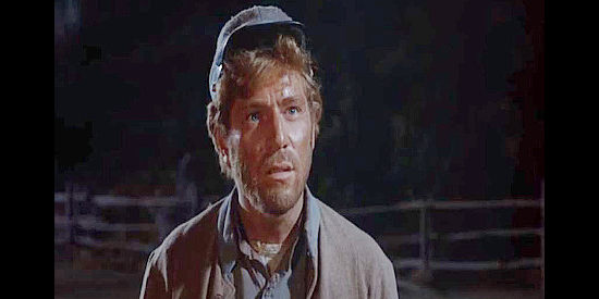 George Segal as Matt Weaver, returning from the Civil War to find his home has been confiscated in Invitiation to a Gunfighter (1964)