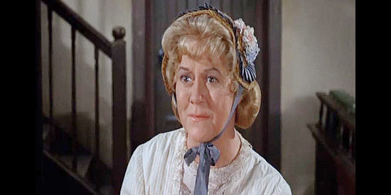 Gertrude Flynn as Hannah Guthrie, reacting to an unexpected gesture of generosity from Jules in Invitation to a Gunfighter (1964)