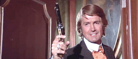 Giacomo Rossi-Stuart as Tricky the gambler, one of Spencer's hired guns in The Fighting Fists of Shanghai Joe (1972)