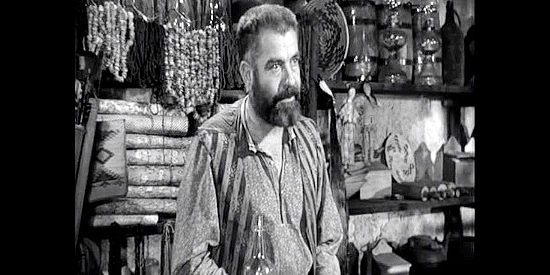 Grant Withers as Meachum, the Indian agent whose cheating ways have prompted the Apache to leave the reservation in Fort Apache (1948)