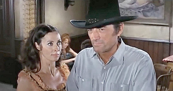 Gregory Peck as Clay Lomax with saloon girl Emma (Rita Gam) in Shoot Out (1971)