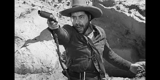 Harold Huber as Lopez, helping fight off an Indian attack in Kit Carson (1940)