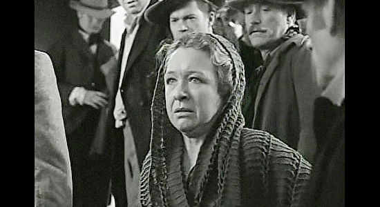 Helen MacKellar as Mrs. Hale, whipping up anger against Fletch McCloud and his family following the death of her husband in Dark Command (1940)