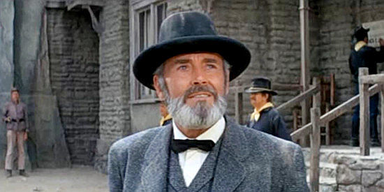 Henry Fonda as Woodward W. Lopeman, arriving at his new job as prison warden in There Was a Crooked Man (1970)