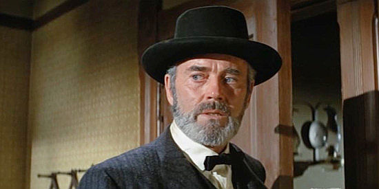 Henry Fonda as Woodward W. Lopeman, chasing a prostitute out of town in There Was a Crooked Man (1970)