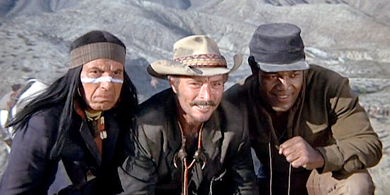 Iron Eyes Cody as Santana, Lee Van Cleef as Jaroo and Jim Brown as Luke, getting their first glimpse of the fort in El Condor (1970)