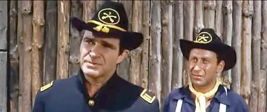 James Philbrook as former Southern officer Adam Hyde dons a Union uniform as a ruse in Finger on the Trigger (1965)
