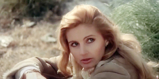 Jill Ireland as Catherine Marcel, getting a sense of what's on Chino's mind in Chino (1973)