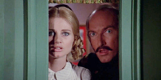 Jill Ireland as Marica Scoville and Ed Lauter and Maj. Claremont, fearing disaster is near in Breakheart Pass (1974)