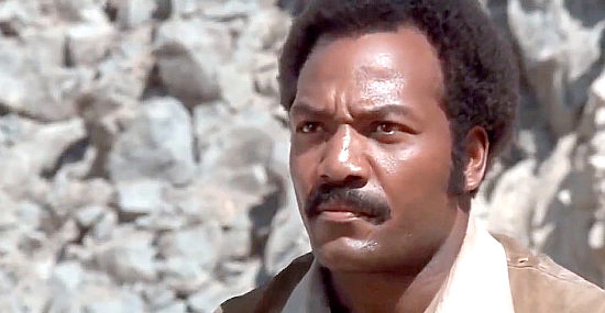Jim Brown as Pike, facing trouble from all directions in Take a Hard Ride (1975)