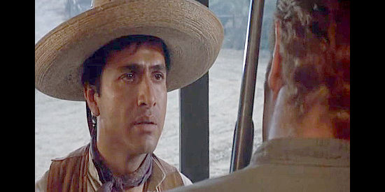 John A. Alonzo as Manuel, Weaver's friend on the Mexican side of town in Invitation to a Gunfighter (1964)