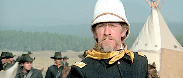 John Anderson as Col. Iverson, riding into a defenseless Cheyenne village in Soldier Blue (1970)