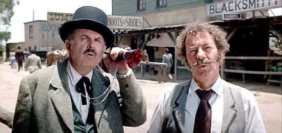 John McGiver as Mayor Golden and Walter Brooke as Luther Harris in Lawman (1971)
