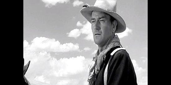 John Wayne as Capt. Kirby York, watching his commanding officer lead an ill-advised attack in Fort Apache (1948)
