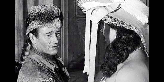 John Wayne as John Breen, catching his first glimpse of lovely Fleurette De Marchand (Vera Ralston) in The Fighting Kentuckian (1949)