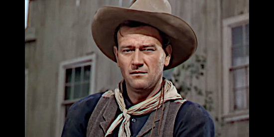 John Wayne as Robert Hightower, realizing the pleasant man he just met is sheriff of Welcome, Ariz., in Three Godfathers (1948)