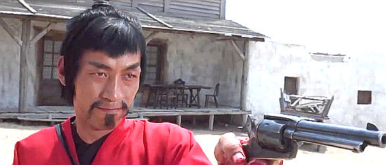 Kassutoshi Mikuriya as Mikuja, one of Spencer's hired killers in The Fighting Fists of Shanghai Joe (1972)
