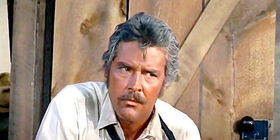 Kerwin Matthews as Marquette, watching things go badly under Jack Remy's direction in Barquero (1970)