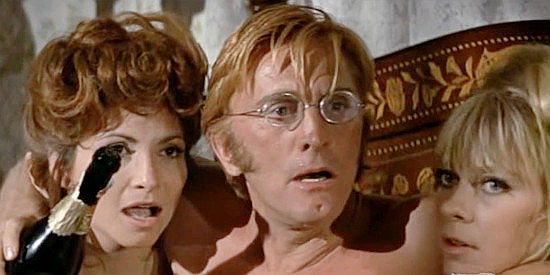 Kirk Douglas as Paris Pittman Jr., recognized by a peeping Tom in a brothel in There Was a Crooked Man (1970)