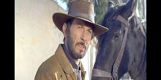 Leonard Nimoy as Miller, the hired gun with a men streak on Catlow's trial in Catlow (1971)