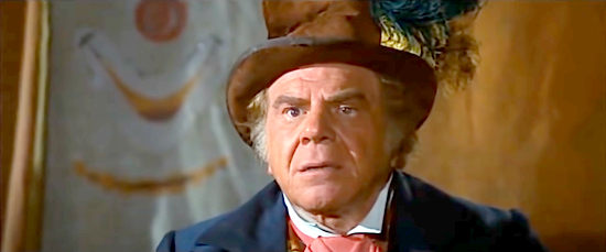 Lionel Stander as Mimmi, leader of the circus in Boot Hill (1969)