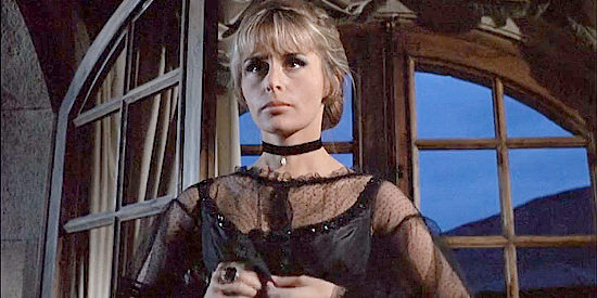 Marianna Hill as Claudine, preparing to use her body as a distraction in El Condor (1970)