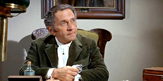 Martin Gabel as Warren LeGoff, welcoming Paris and his companions to prison in There Was a Crooked Man (1970)