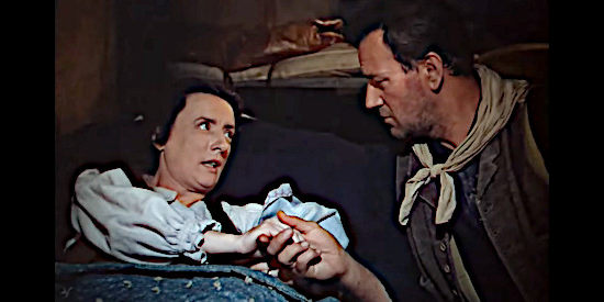 Mildred Natwick as the mother, introducing her infant to Robert Hightower (John Wayne) in Three Godfathers (1948)