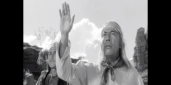 Miquel Inclan as Cochise, meeting with Capt. York and Sgt. Beaufort to negotiate a peaceful return to the Apache reservation in Fort Apache (1948)