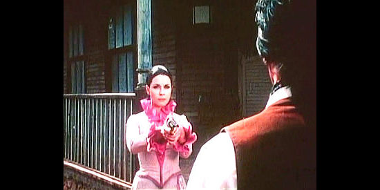 Monica Randall as Lola, looking to correct the mistake she makes in Federal Man (1974)