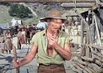 Lee Van Cleef as Travis, ready to defend his barge at all costs in Barquero (1970)