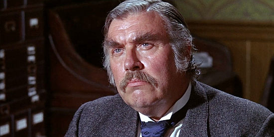Peter Whitney as Cushing, the banker who gives Cable the loan to develop his waterhole in The Ballad of Cable Hogue (1970)