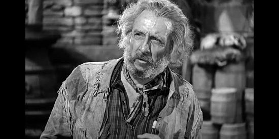 Raymond Hatton as Jim Bridger, the old timer and friend of frontier scout Kit Carson in Kit Carson (1940)