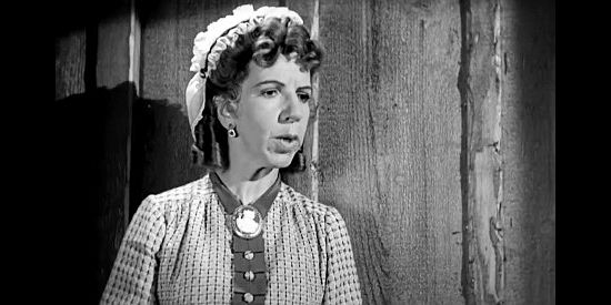 Renie Riano as Miss Pilchard, Dolores' companion, who takes a liking to Ape in Kit Carson (1940)