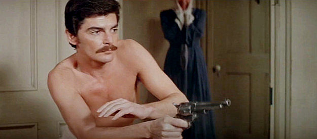 Richard Benjamin as Peter Martin, springing into six-gun action Old West style in Westworld (1973)