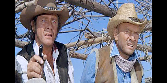 Richard Crenna as Ben Cowan and Yul B rynner as Catlow, facing an Indian attack armed with just one derringer in Catlow (1971)