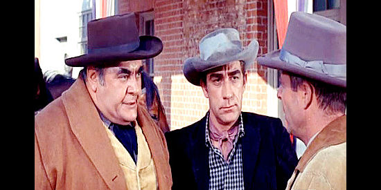 Robert Middleton as Clay Matthews and Richard Devon as Vince Bodine, exerting pressure on Harry Travers in Cattle King (1963)
