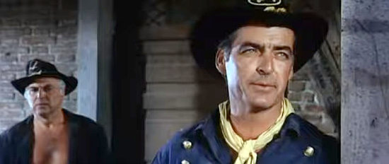 Rory Calhoun as Larry Winton tries to reason with soldier who have gold fever in Finger on the Trigger (1965)