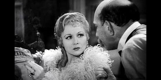 Sharon Lynn as saloon singer Lola Marcel, being convinced to pose as Mary Roberts in Way Out West (1937)