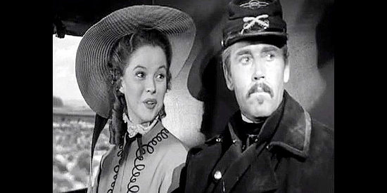 Shirley Temple as Philadelphia and Henry Fonda as her dad, Lt. Col. Owen Thursday en route to his new post at Fort Apache in Fort Apache (1948)