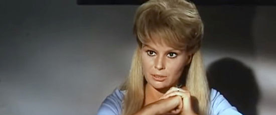 Silvia Solar as Violet expresses her plans for the gold in Finger on the Trigger (1965)