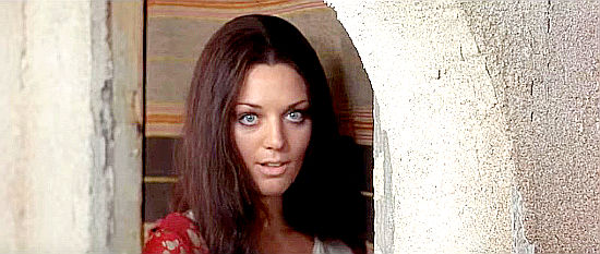 Simonetta Vitelli as Inez, suggesting Django stay a while longer in “A Man Called Django” (1972)