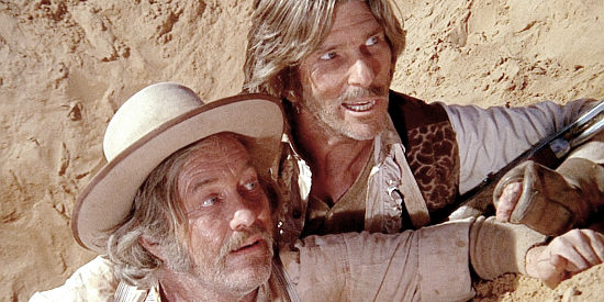 Strother Martin as Bowen and L.Q. Jones as Taggart, trapped in a hole of their own digging in The Ballad of Cable Hogue (1970)