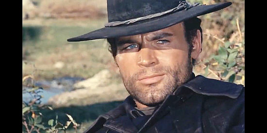Terence Hill as Django, explaining the goal and mission to the men he's saved in Django Prepare a Coffin (1968)