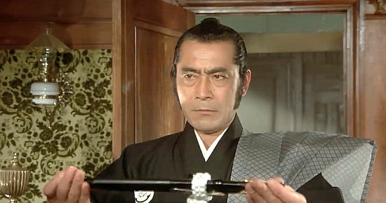 Toshiro Mifune as Kuroda, accepting his mission in Red Sun (1971)