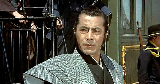 Toshiro Mifune as Kuroda, assigned with retrieving a one-of-a-kind sword in Red Sun (1971)
