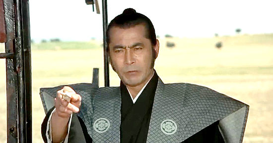 Toshiro Mifune as Kuroda, issuing a challenge to Gauche in Red Sun (1971)