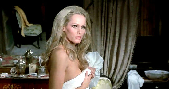 Ursula Andress as Cristina, gets an unwelcome visitor in Red Sun (1971)