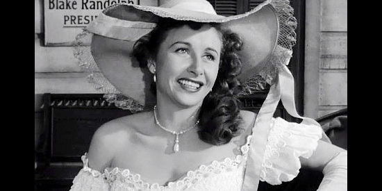 Vera Ralston as Fleurette De Marchand, bored and about to take a buggy ride with a stranger in The Fighting Kentuckian (1949)