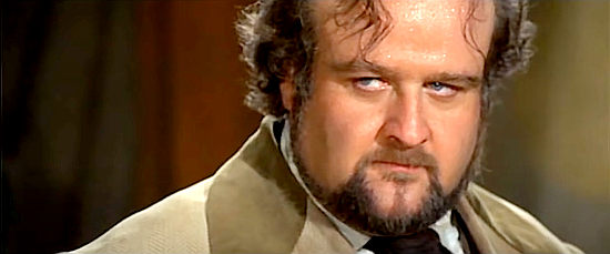 Victor Buono as Honey Fisher, the businessman forcing miners to sell in Boot Hill (1969)
